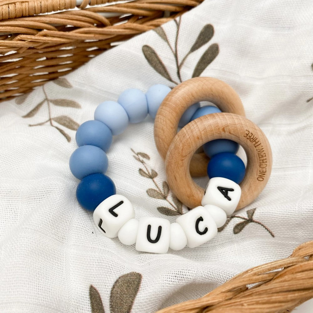 Personalised Silicone Beads On Wooden Rings Teether Rattle