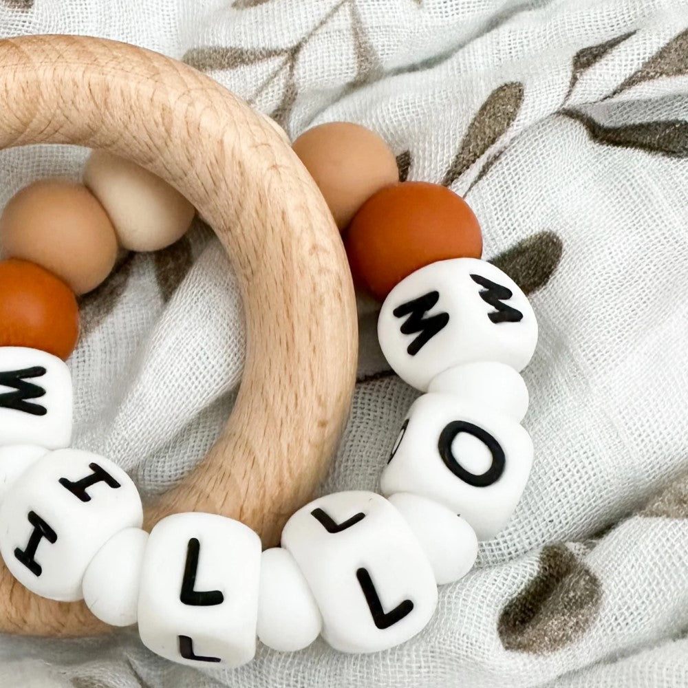 Personalised Silicone Beads On Wooden Rings Teether Rattle