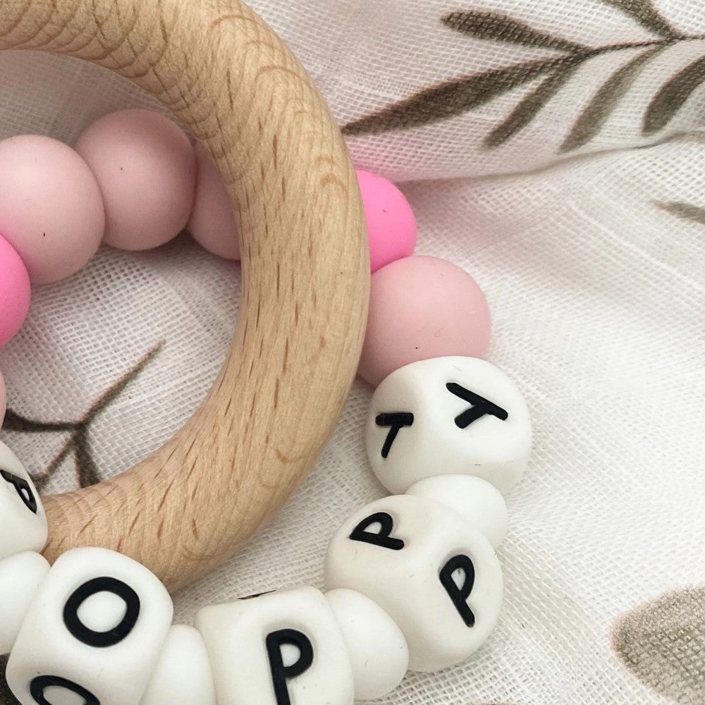 Personalised Silicone Beads On Wooden Rings Teether Rattle